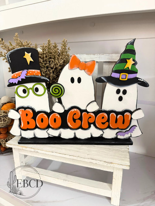 Boo Crew hand painted Halloween shelf sitter ghost decor with three colorful ghosts and layered BOO CREW lettering.